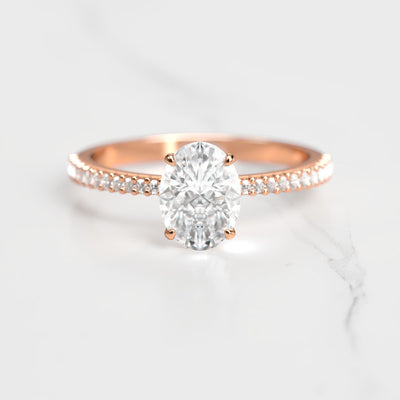 Oval half pave tapered moissanite ring