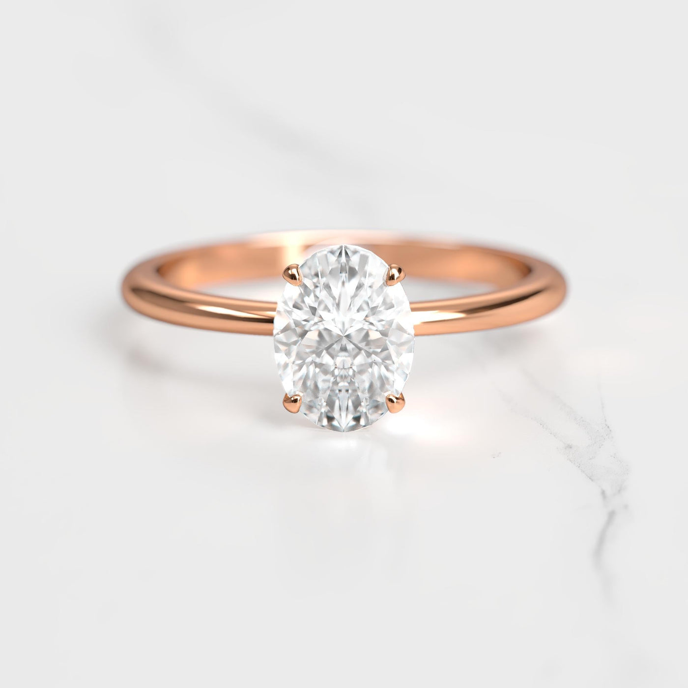 Oval Tapered Solitaire Diamond Ring