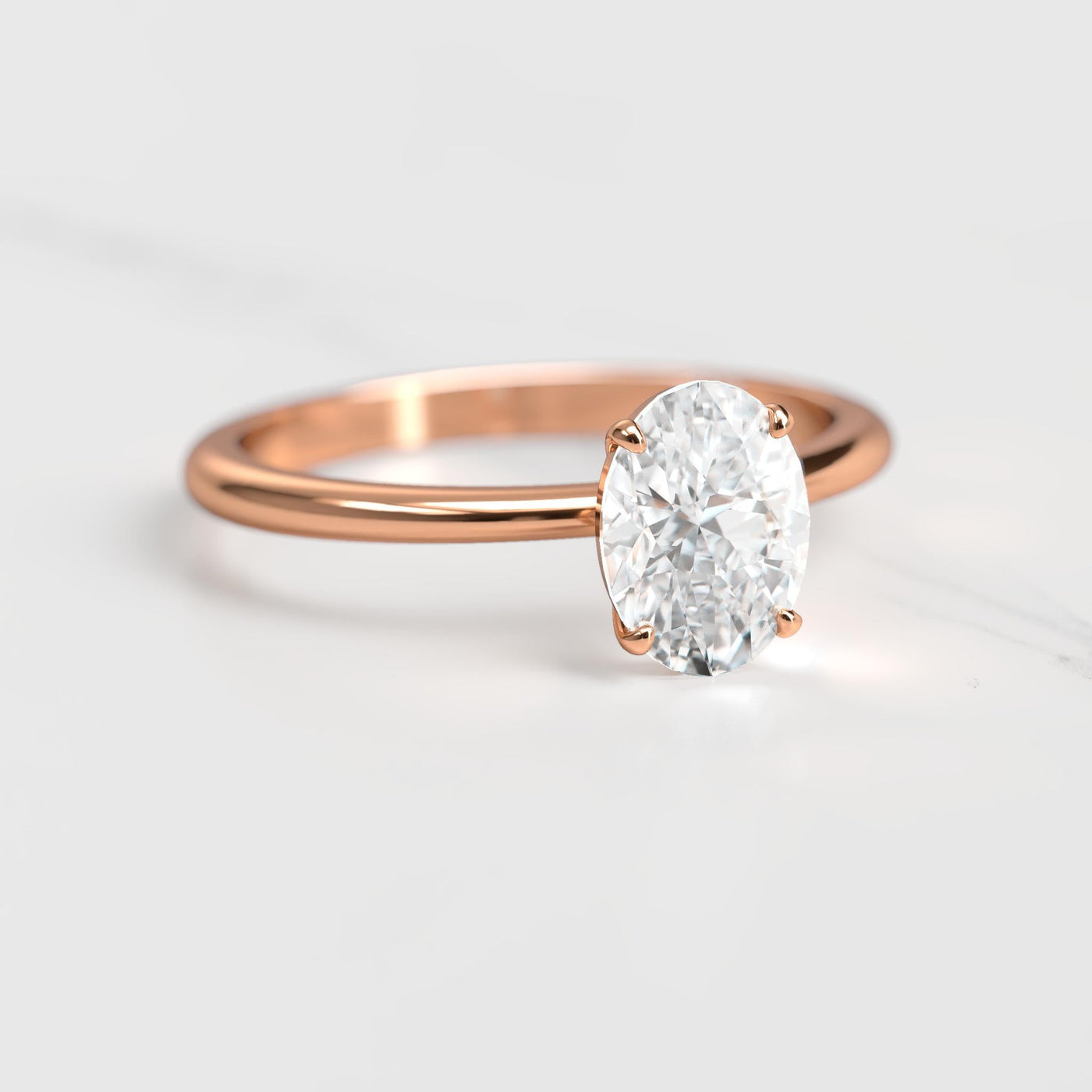 Oval Tapered Solitaire Diamond Ring