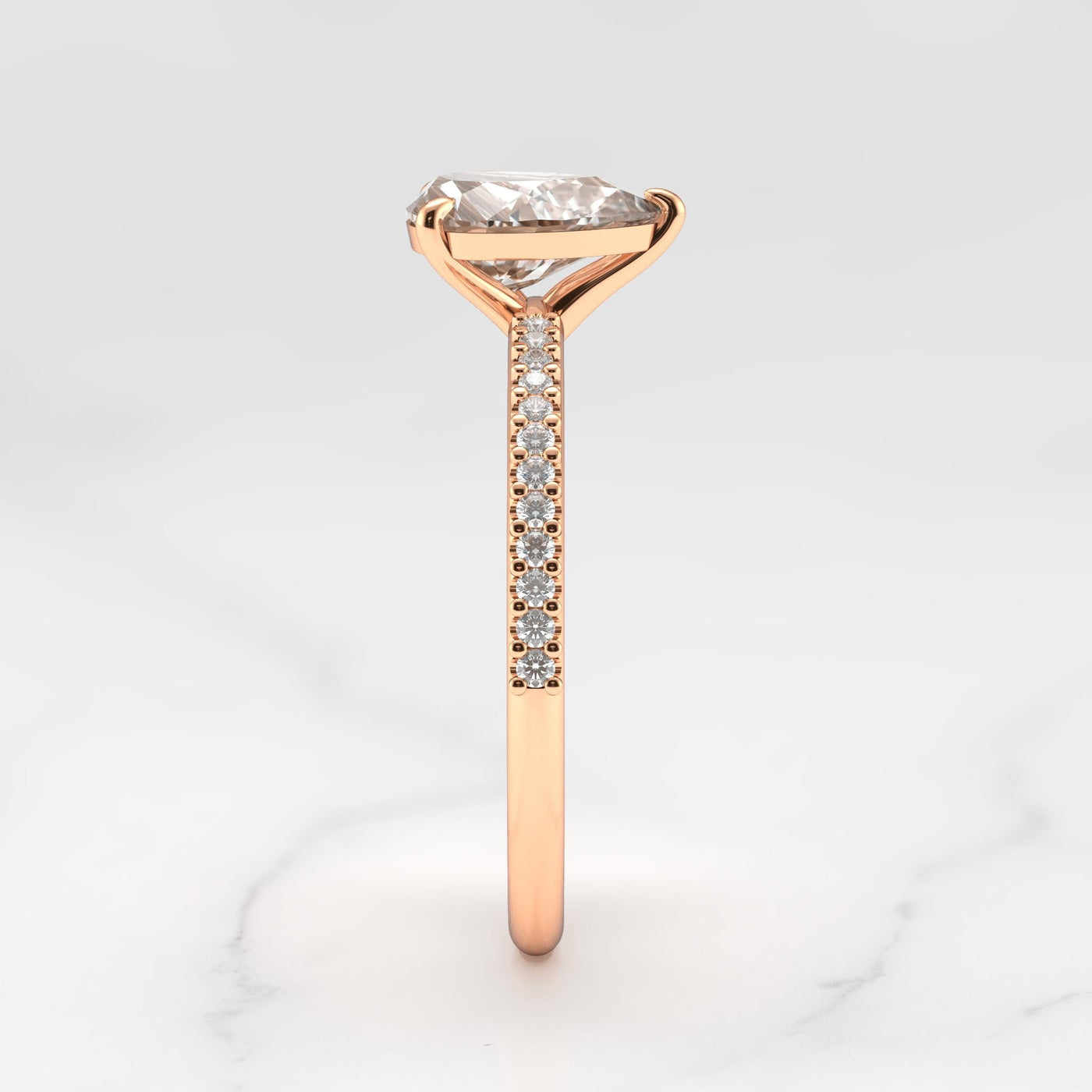Pear-shaped half pave diamond ring