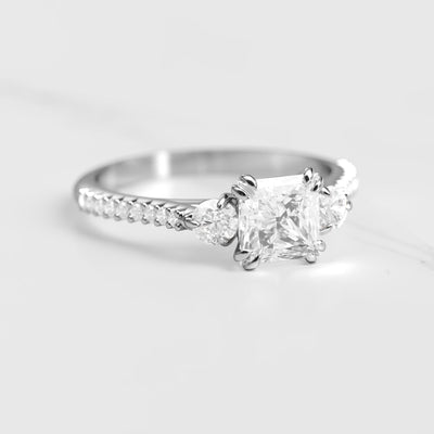 Princess-cut half pave white diamond ring with accent stones