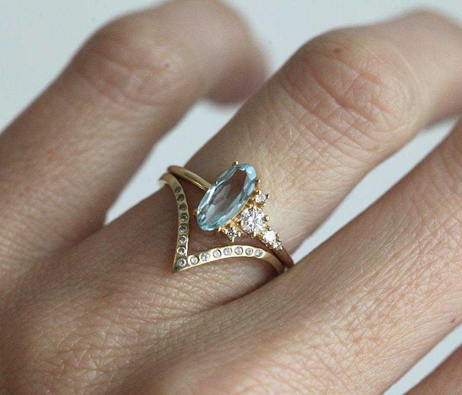 Oval Aquamarine Yellow Gold Ring with Asymmetrical Side Cluster Diamonds