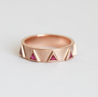 Triangle-shaped purplish red ruby half eternity ring