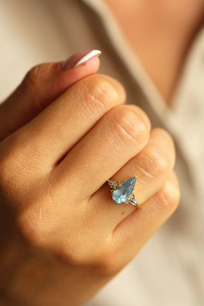 Pastel Blue Sapphire ring with salt pepper accent diamonds