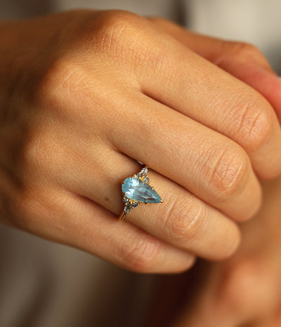 Pastel Blue Sapphire ring with salt pepper accent diamonds