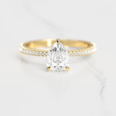 Pear-shaped full-pave tapered moissanite ring