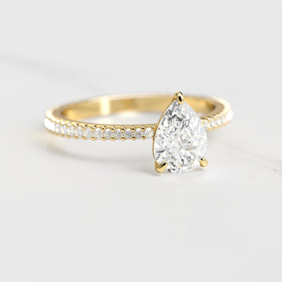 Pear-shaped full-pave tapered moissanite ring