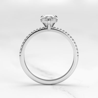 Pear-shaped half pave moissanite ring