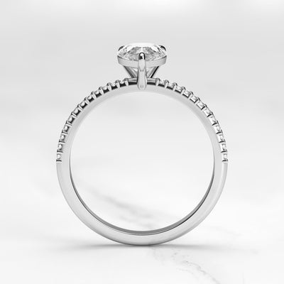 Pear-shaped half pave tapered moissanite ring