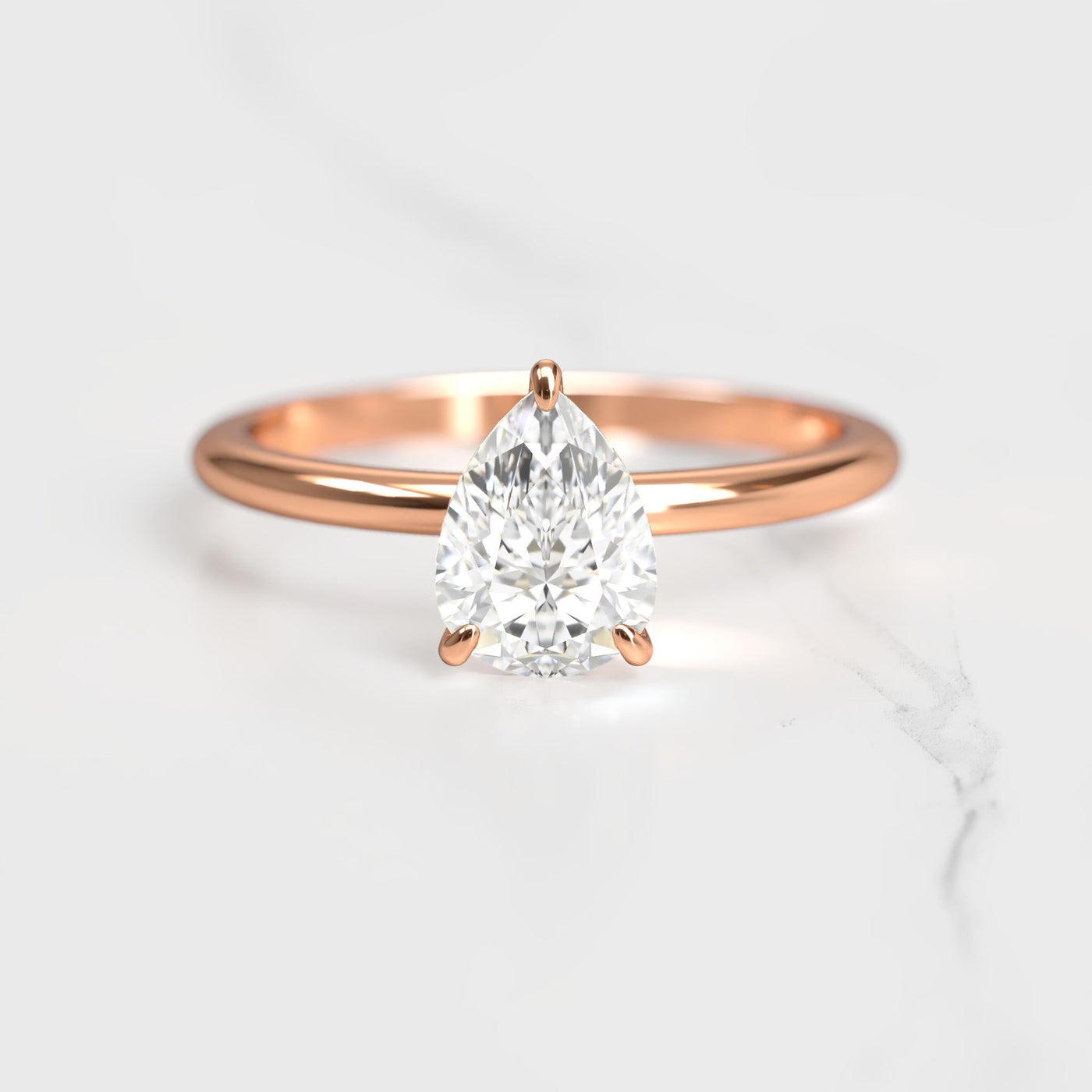 Pear Tapered Solitaire Diamond Ring