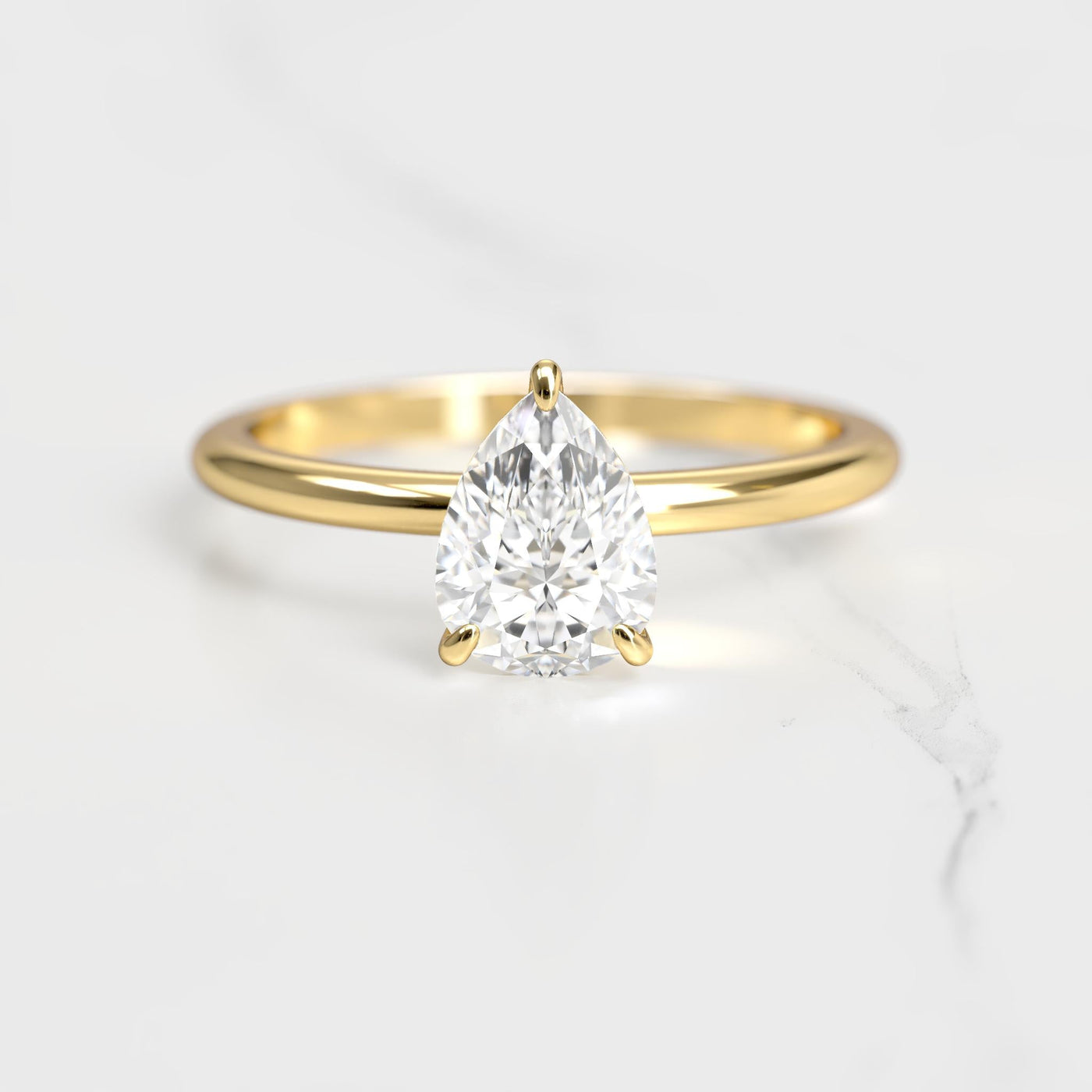 Pear Tapered Solitaire Diamond Ring