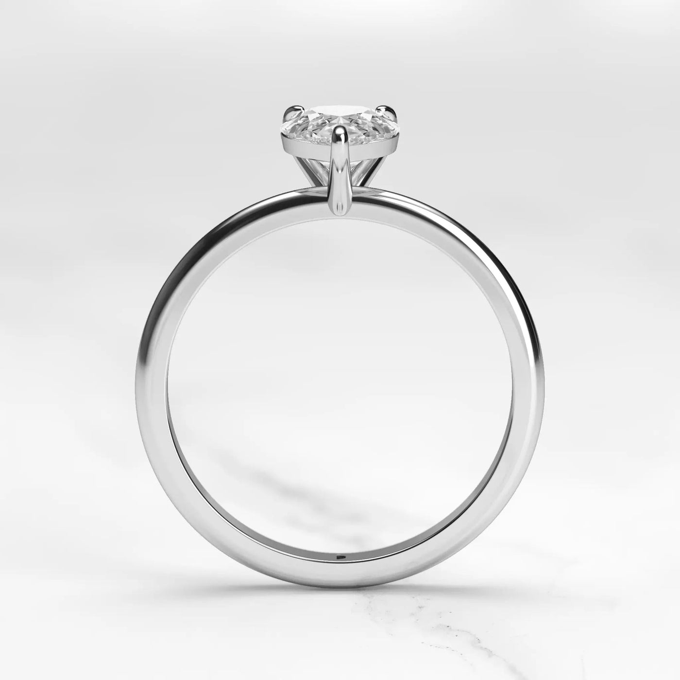 Pear-shaped tapered solitaire moissanite ring