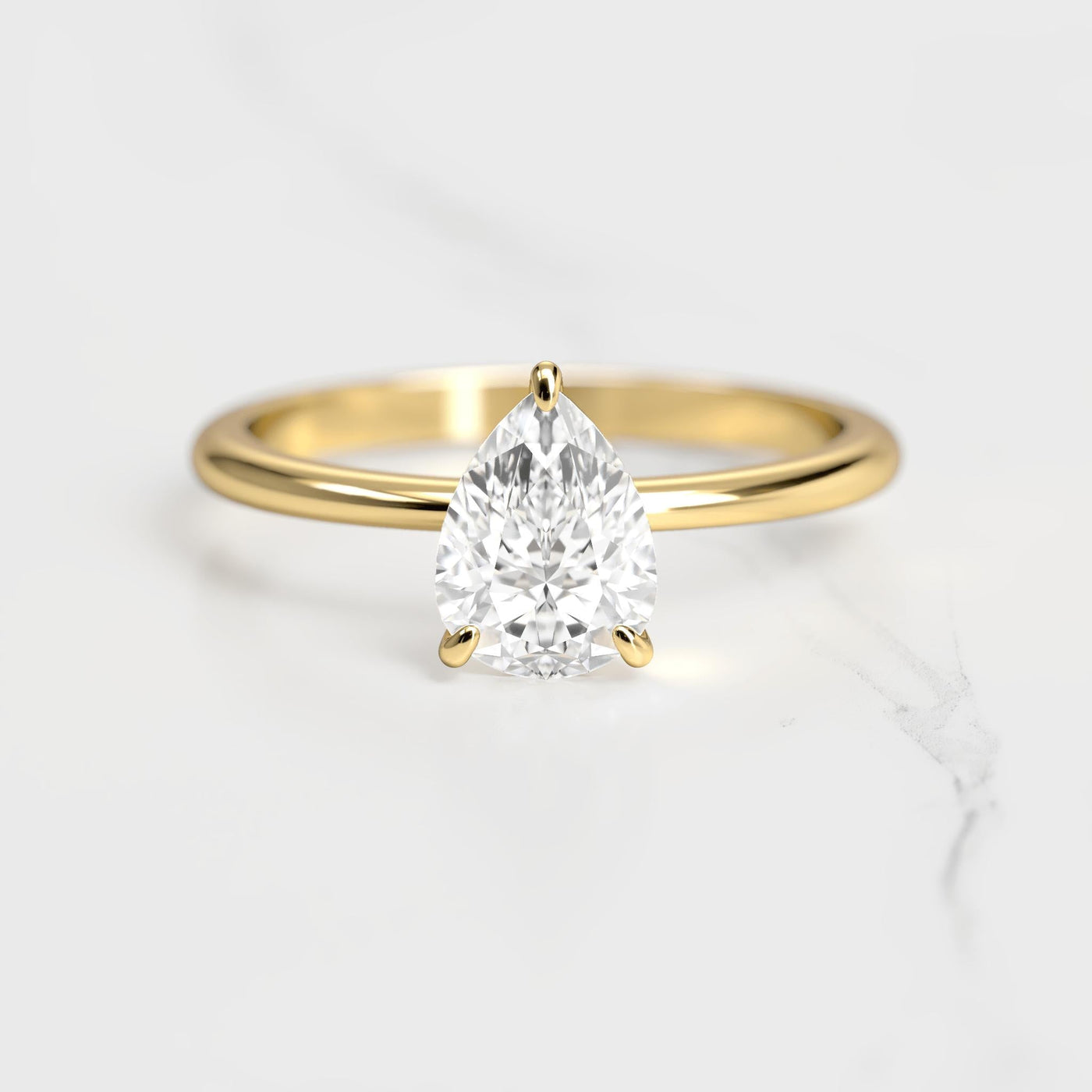 Pear-shaped tapered solitaire moissanite ring