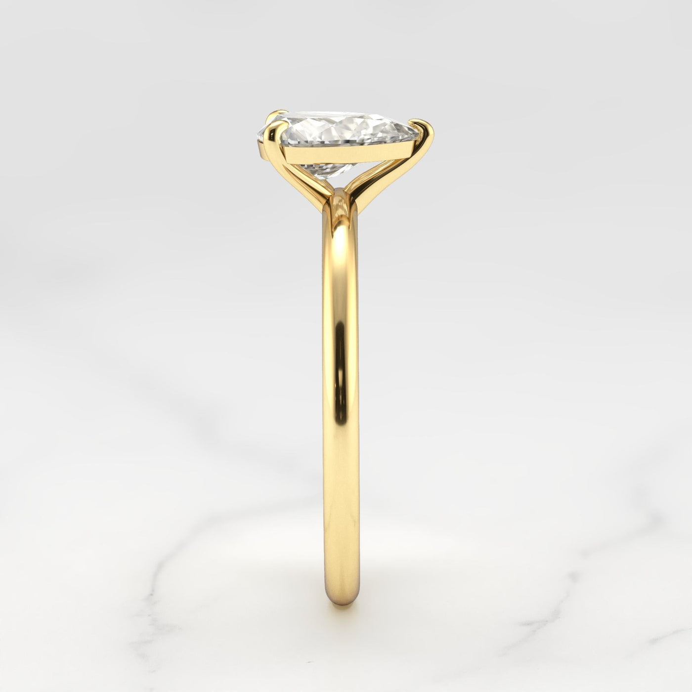 Pear Tapered Solitaire Diamond Ring