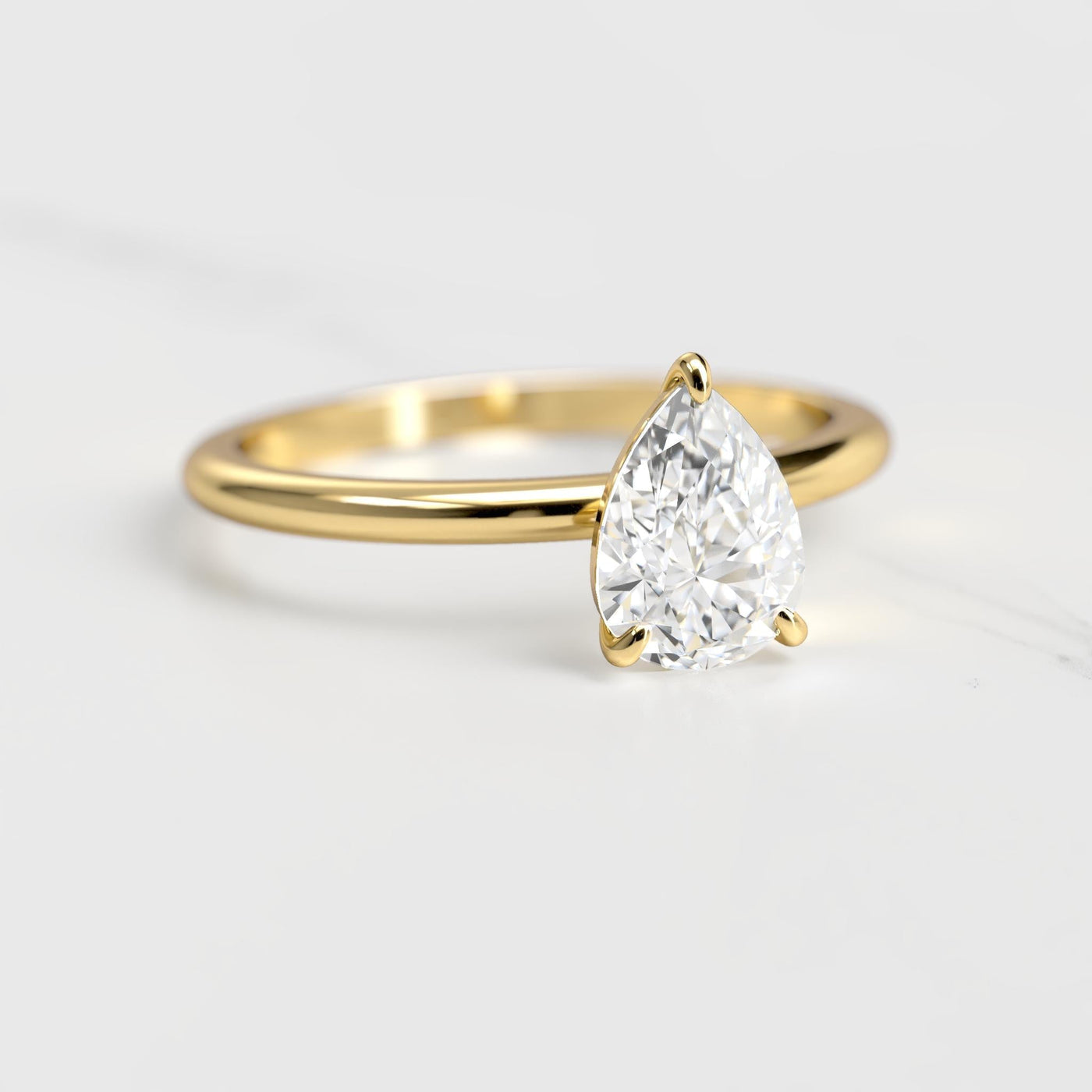 Pear Tapered Solitaire Diamond Ring