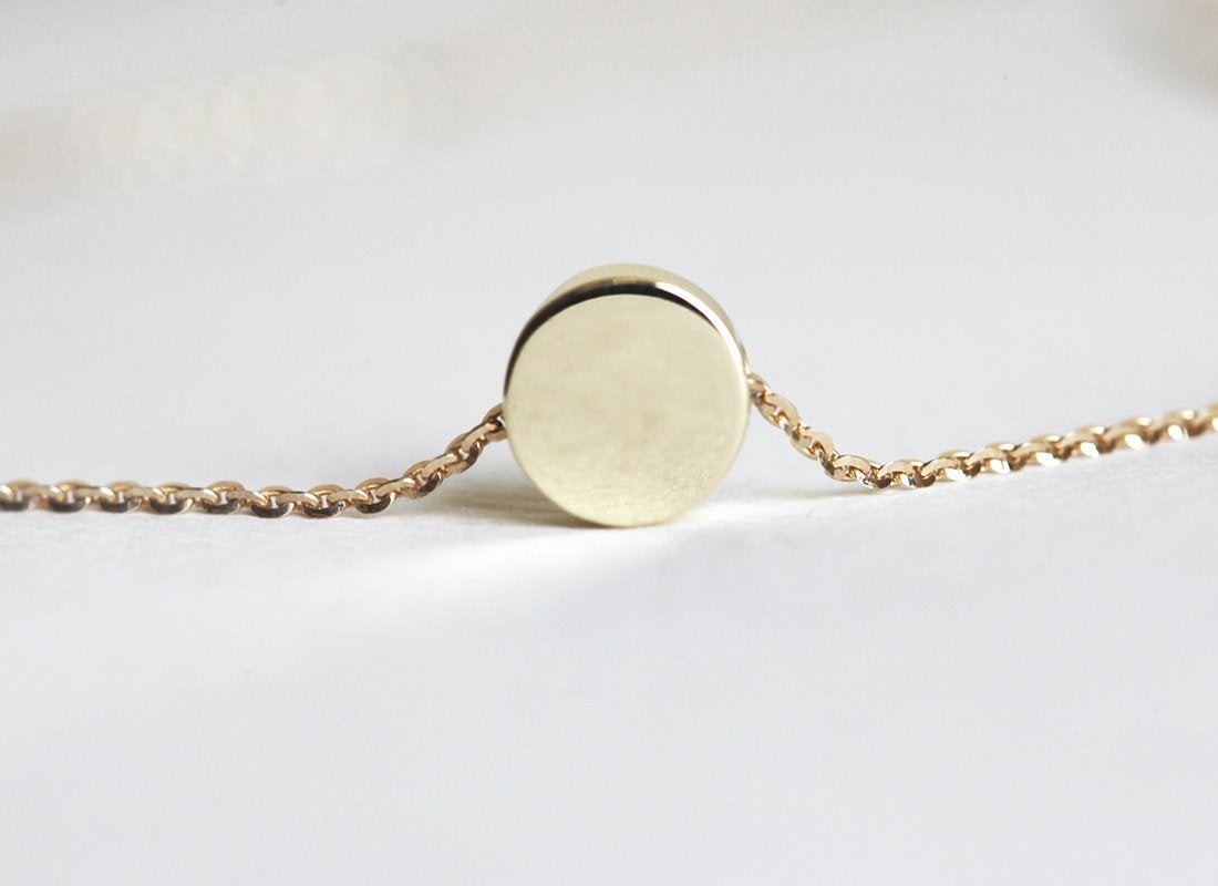 Gold chain necklace with gold disc