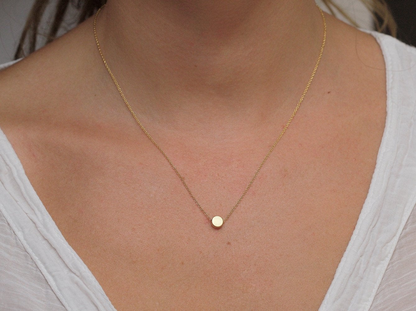 Gold chain necklace with gold disc