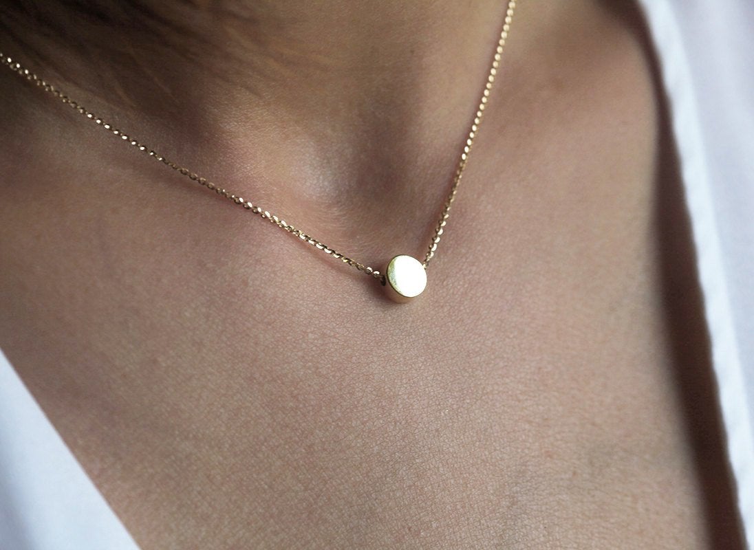 Gold chain necklace with gold disc
