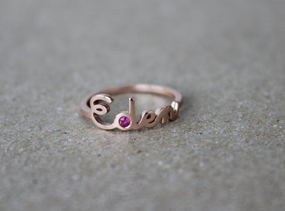 Personalized name gold ring with round red ruby