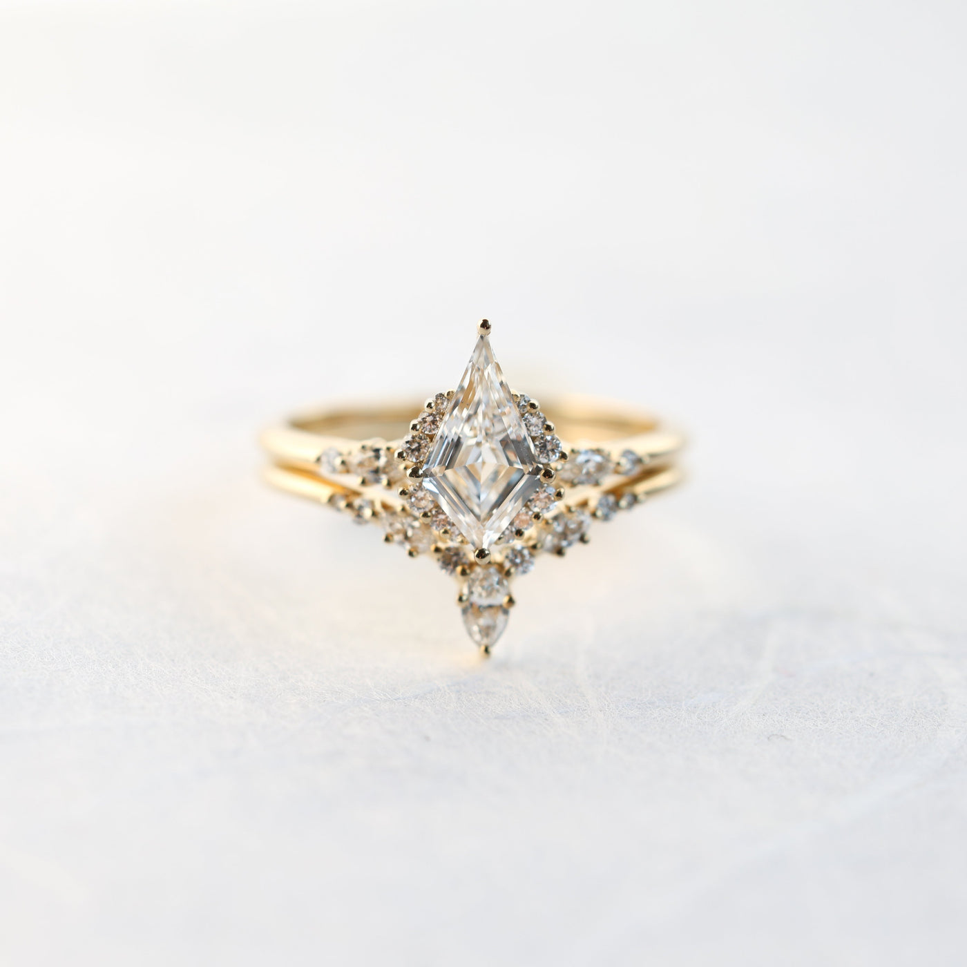 Kite-shaped white diamond engagement ring set