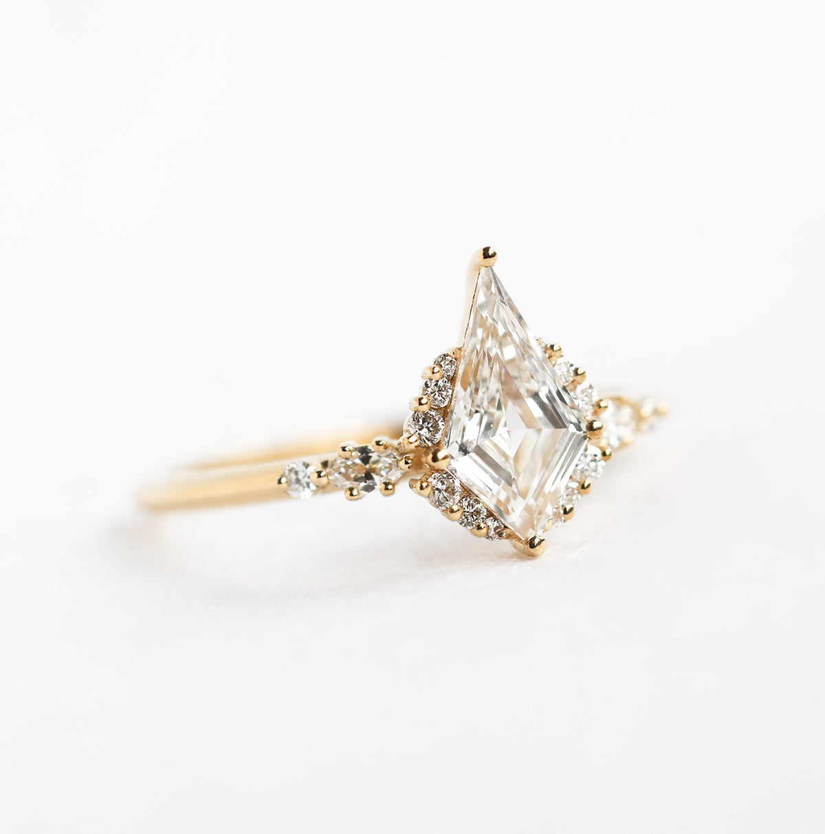 Kite-shaped white diamond engagement ring set