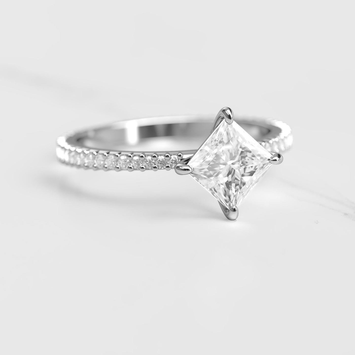 Princess-cut full pave tapered moissanite eternity ring