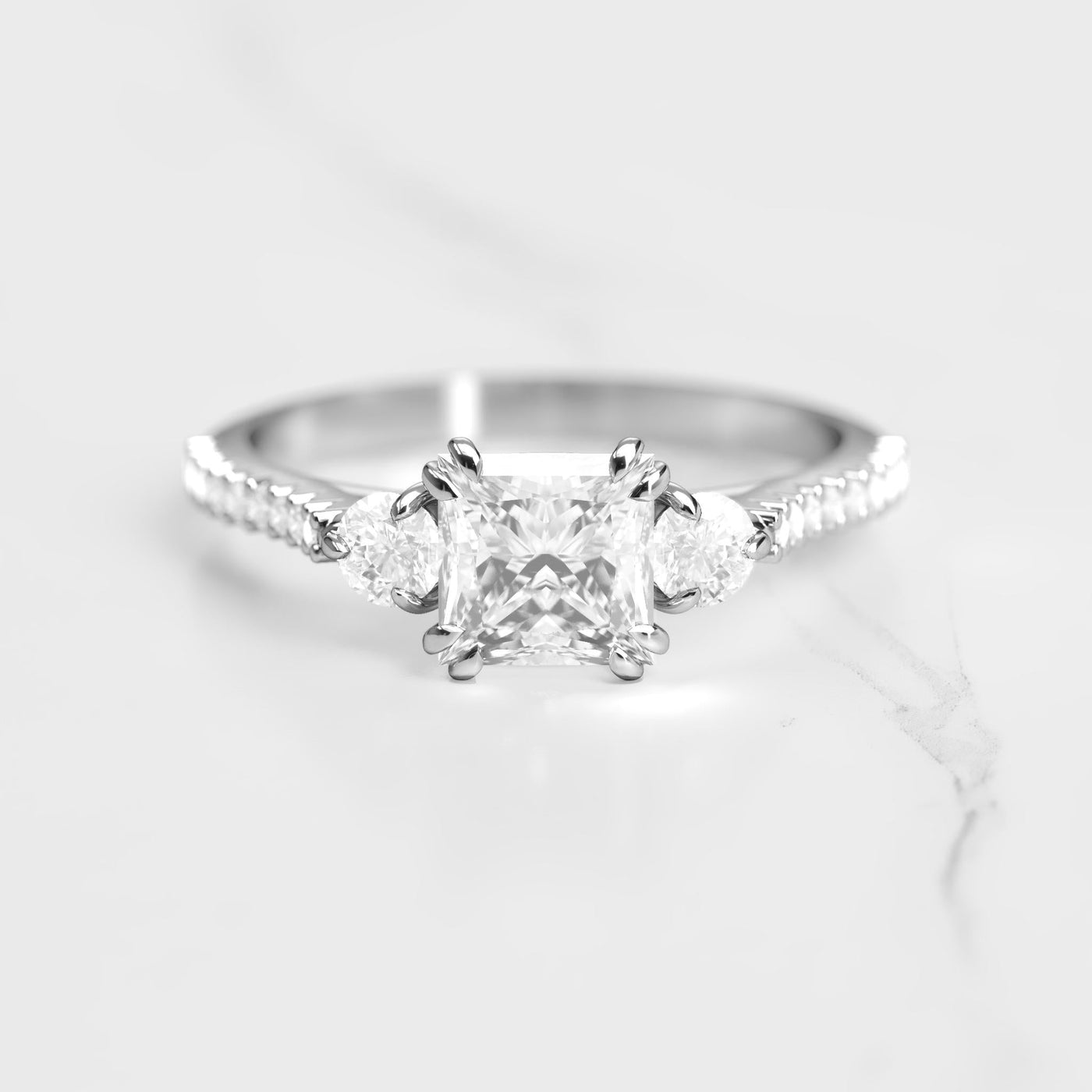 Princess-cut half pave white diamond ring with accent stones