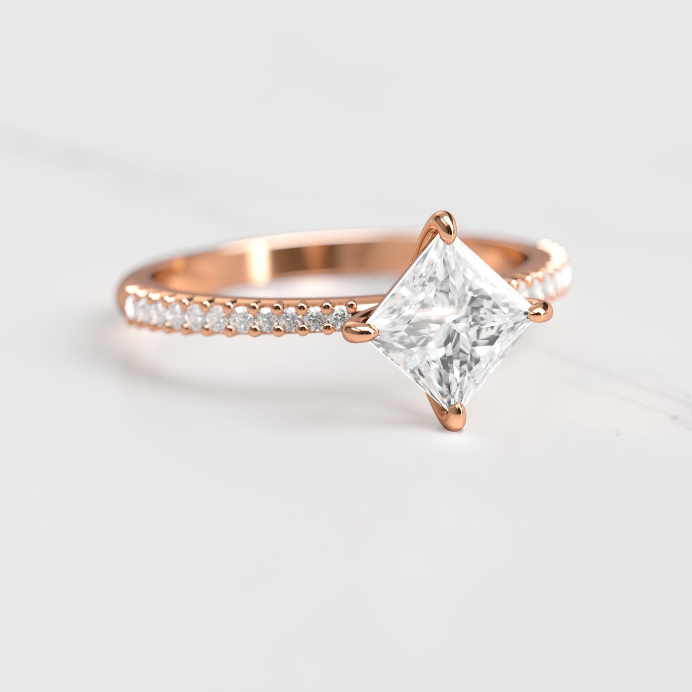 Princess-cut half pave tapered moissanite ring