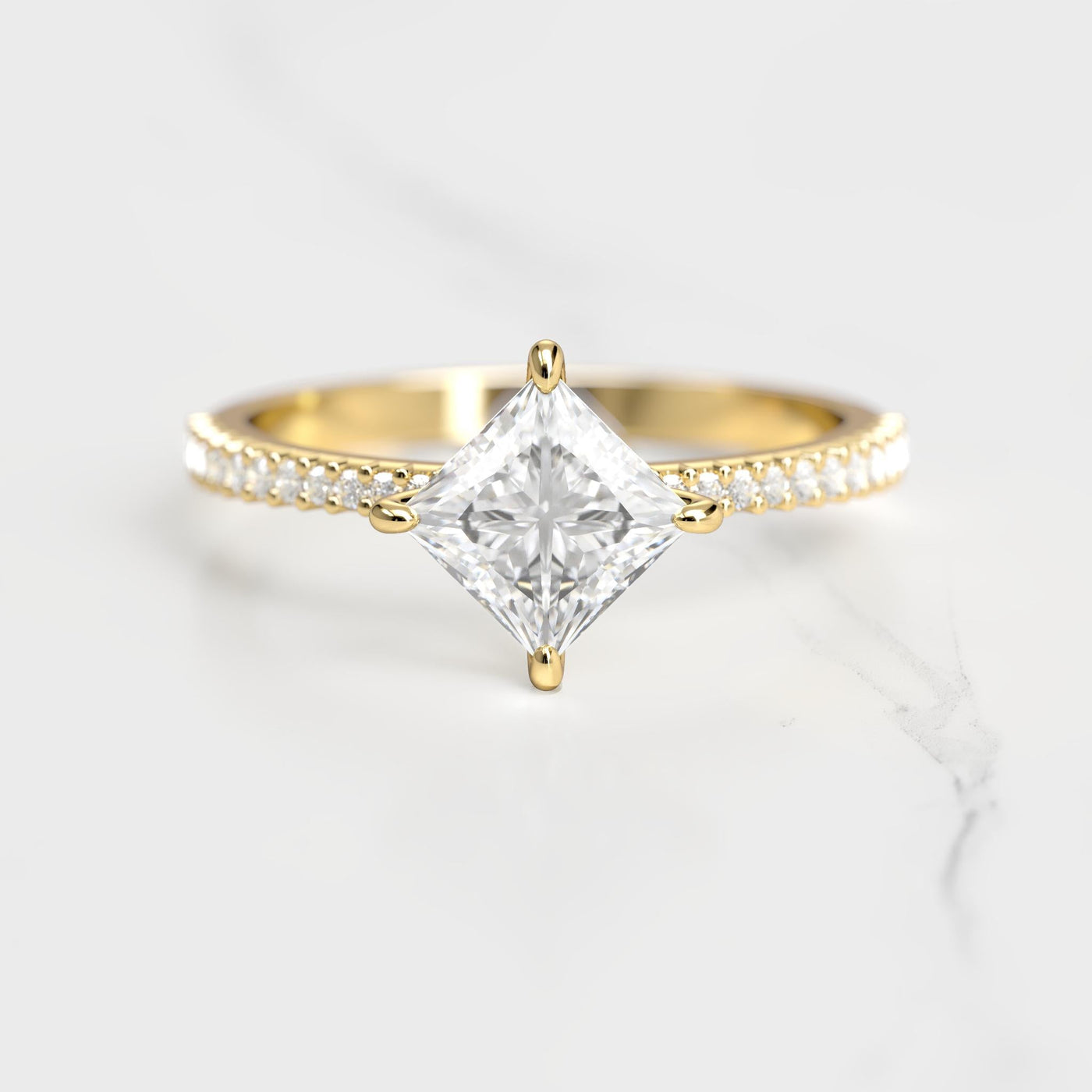 Princess-cut half pave tapered moissanite ring