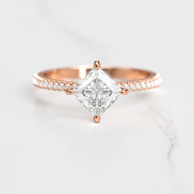 Princess-cut half pave tapered moissanite ring