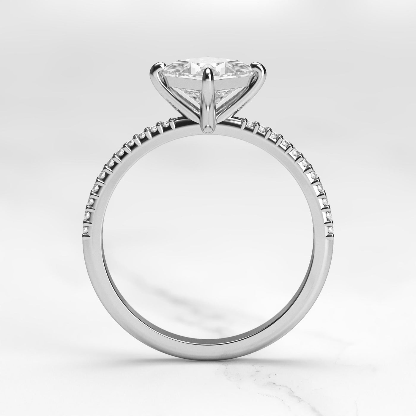 Princess-cut half pave tapered moissanite ring