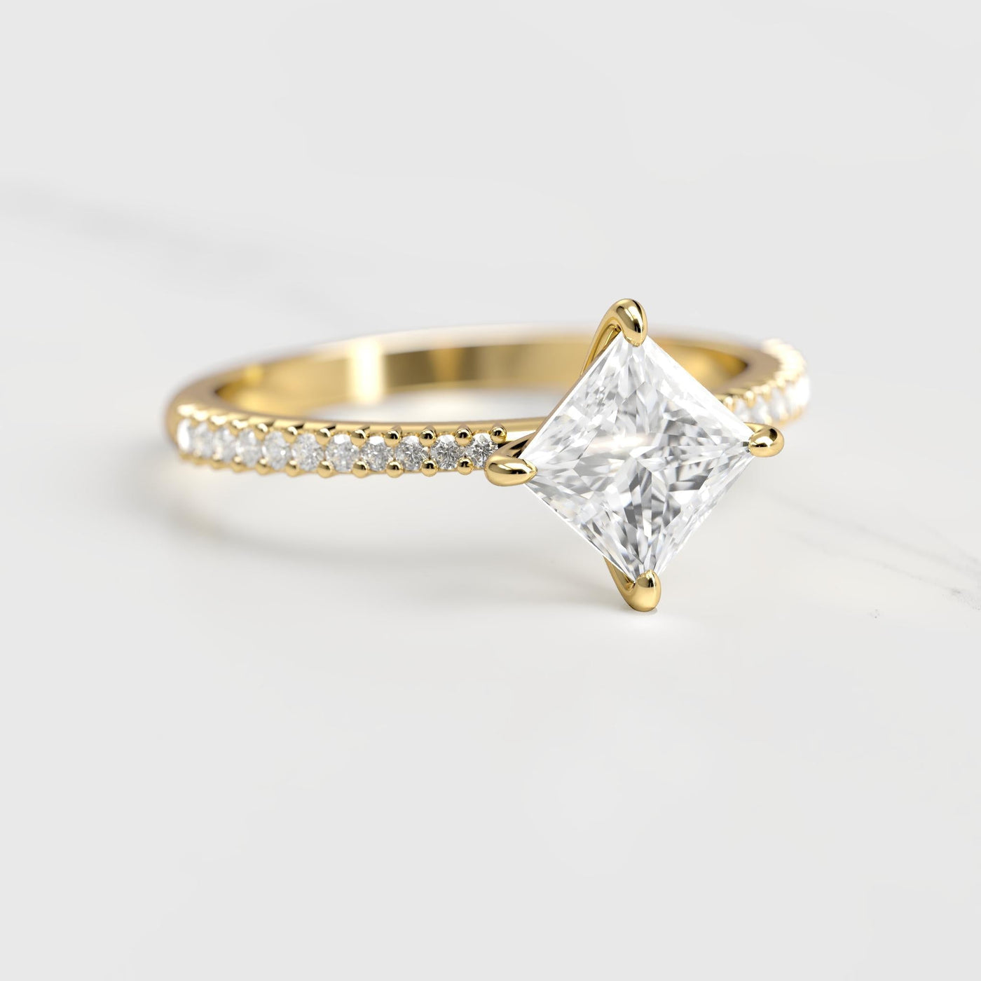 Princess-cut half pave tapered moissanite ring