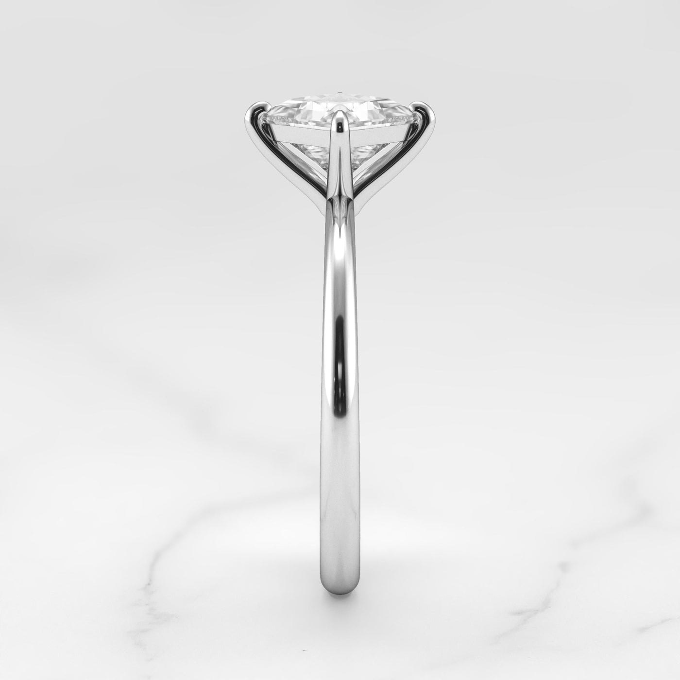 Princess-cut tapered solitaire diamond ring