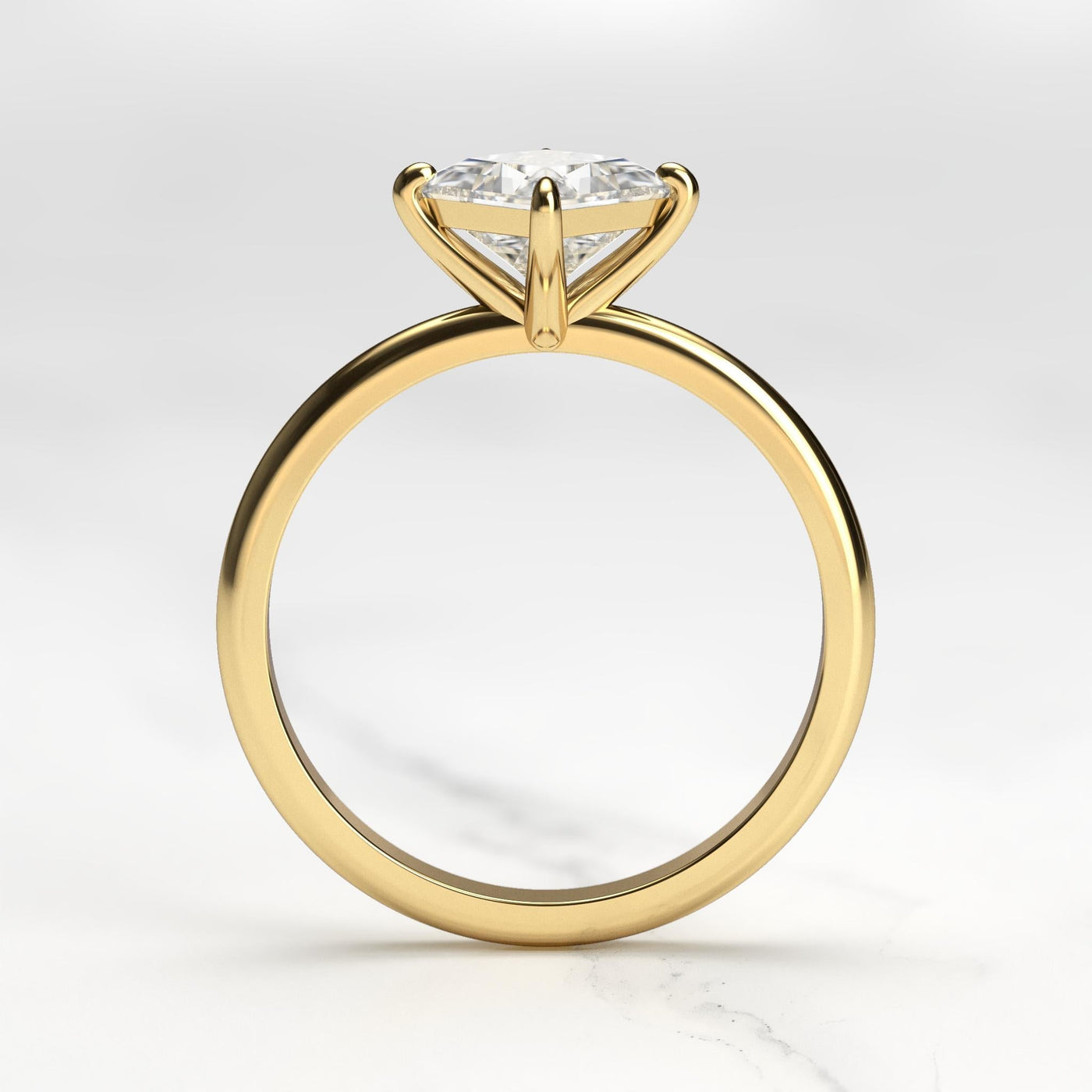 Princess-cut tapered solitaire moissanite ring