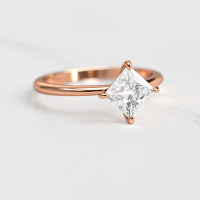 Princess-cut tapered solitaire moissanite ring