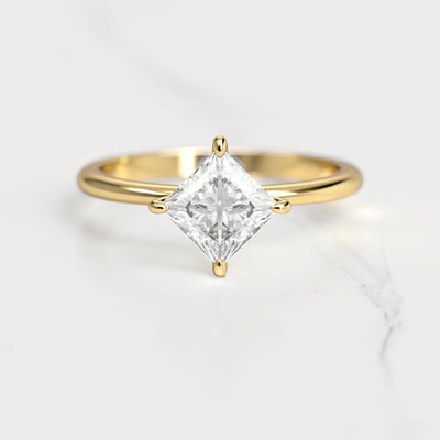 Princess-cut tapered solitaire moissanite ring