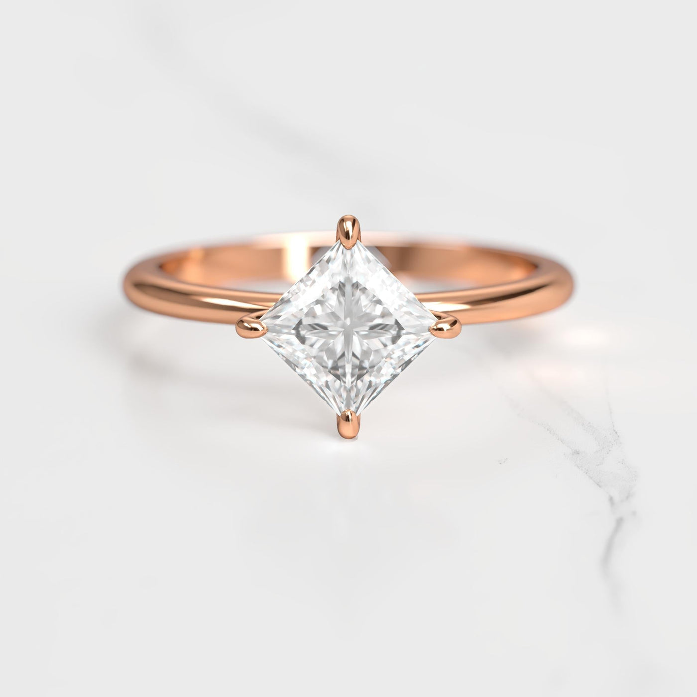 Princess-cut tapered solitaire moissanite ring