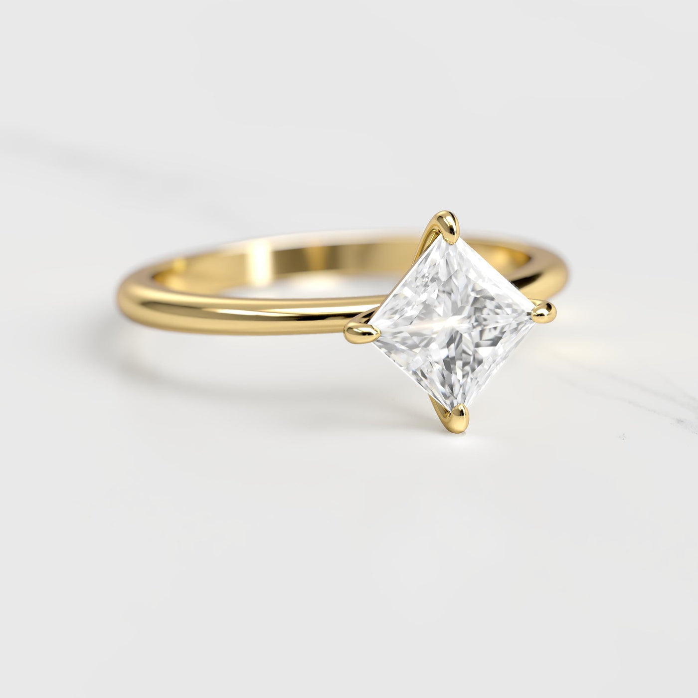 Princess-cut tapered solitaire moissanite ring