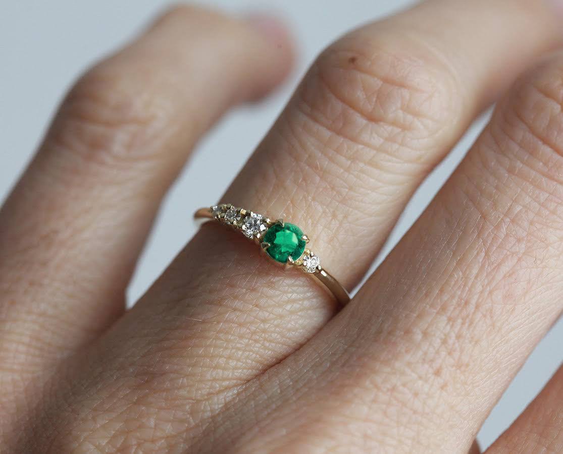 Round Emerald Cluster Ring with Asymmetrically Placed White Diamonds