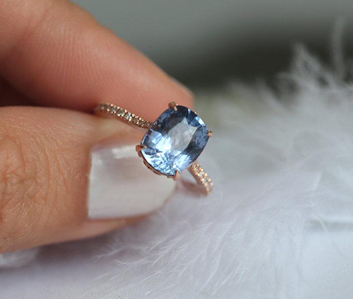 Cushion-cut blue sapphire ring with diamonds