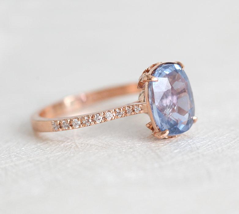 Cushion-cut blue sapphire ring with diamonds