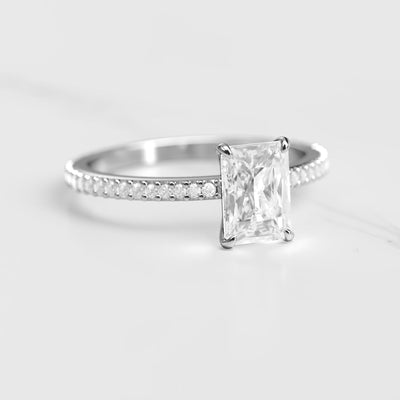 Radiant-cut half pave tapered diamond eternity ring