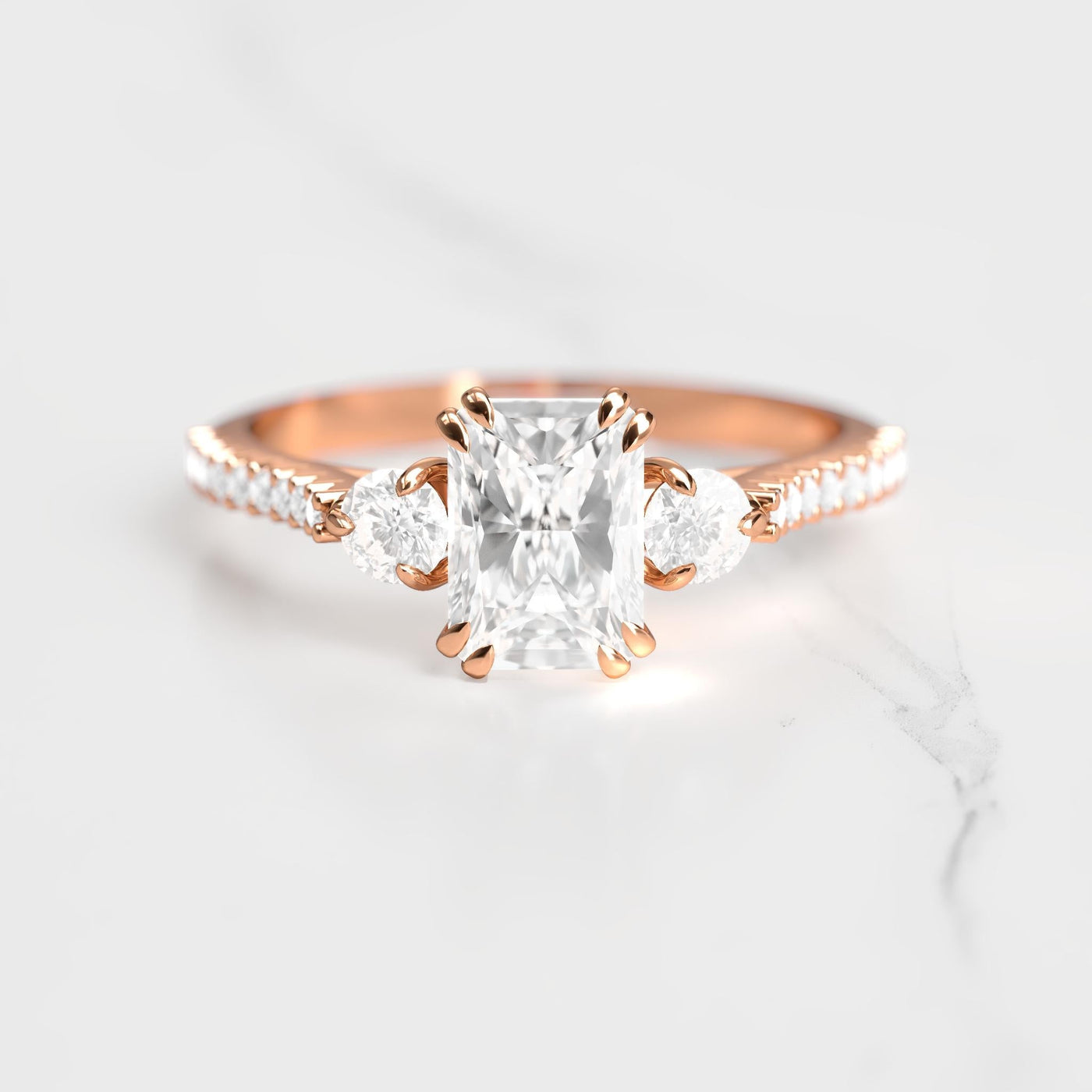 Radiant half pave white diamond ring with accent stones