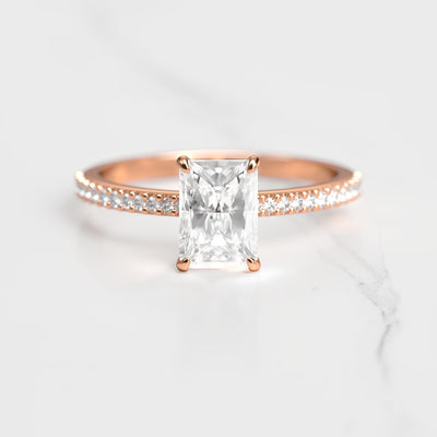 Radiant half pave moissanite eternity ring