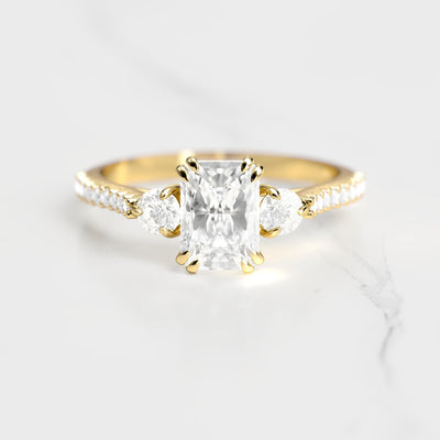 Radiant half pave white moissanite ring with accent stones