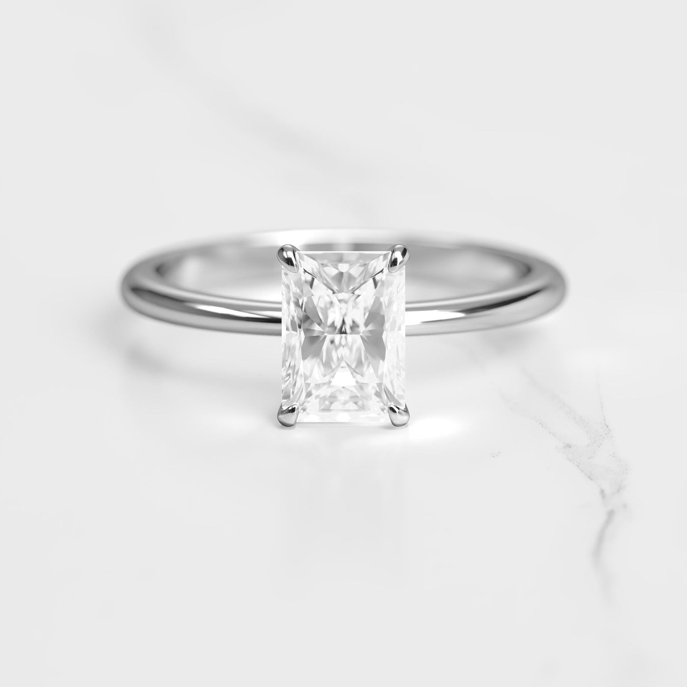 Radiant solitaire moissanite ring