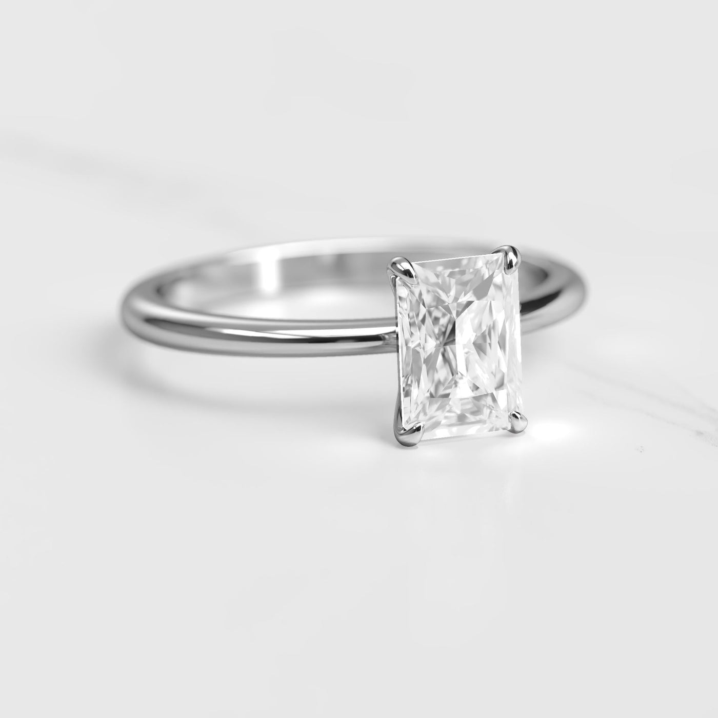 Radiant solitaire moissanite ring