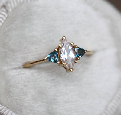Marquise-cut white sapphire ring with topaz gemstones