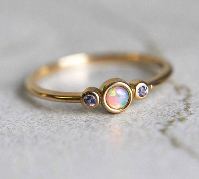 3-Stone Round Opal Ring with 2 Side Round Tanzanite Gemstones