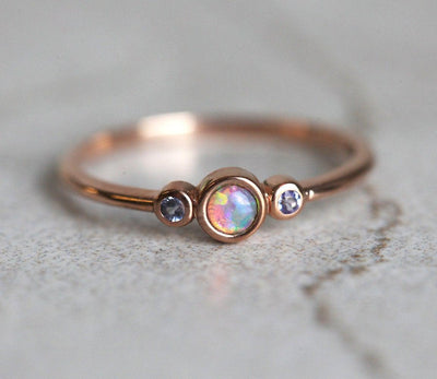 3-Stone Round Opal Ring with 2 Side Round Tanzanite Gemstones